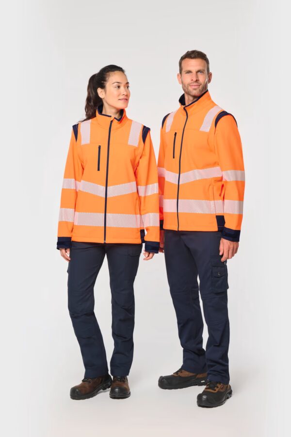 Veste softshell WK460 unisexe, textile recyclé, manches détachables, déperlante, capuche cachée, poches pratiques. Polyvalente et personnalisable pour usage pro. orange fluo